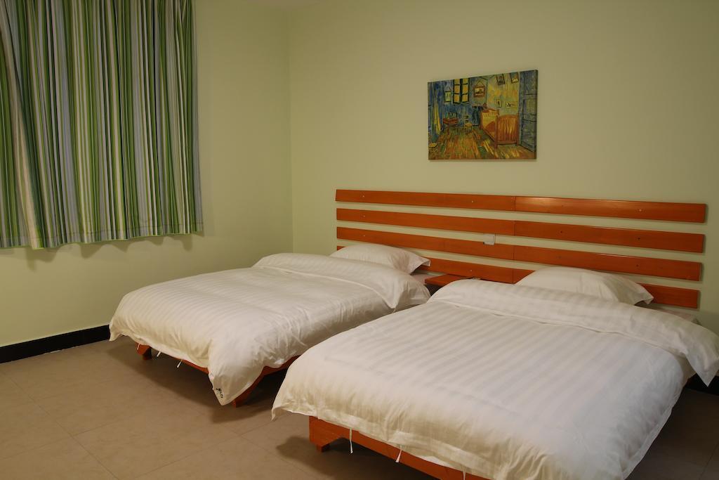 יאנג שואו Tiffany Hostel חדר תמונה